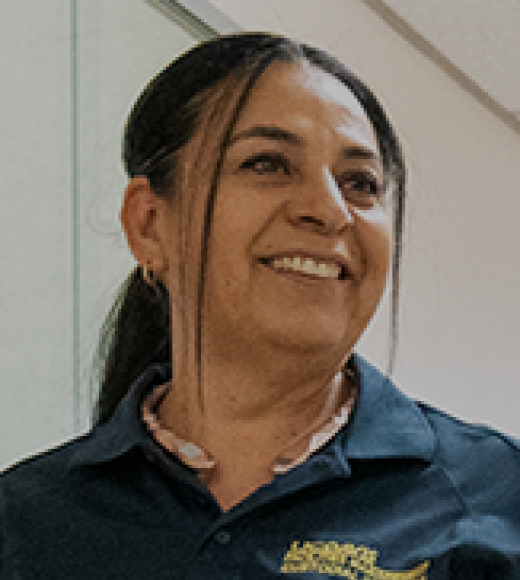 Josefina smiling and wearing a UC Davis polo