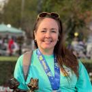 Woman with a medal around her neck