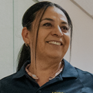 Josefina smiling and wearing a UC Davis polo